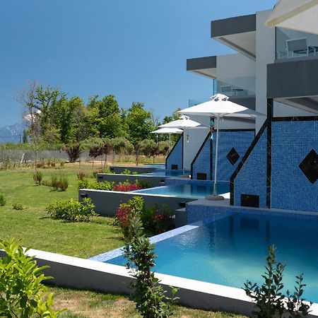 Elysium Villas Quartet Sarti Bagian luar foto