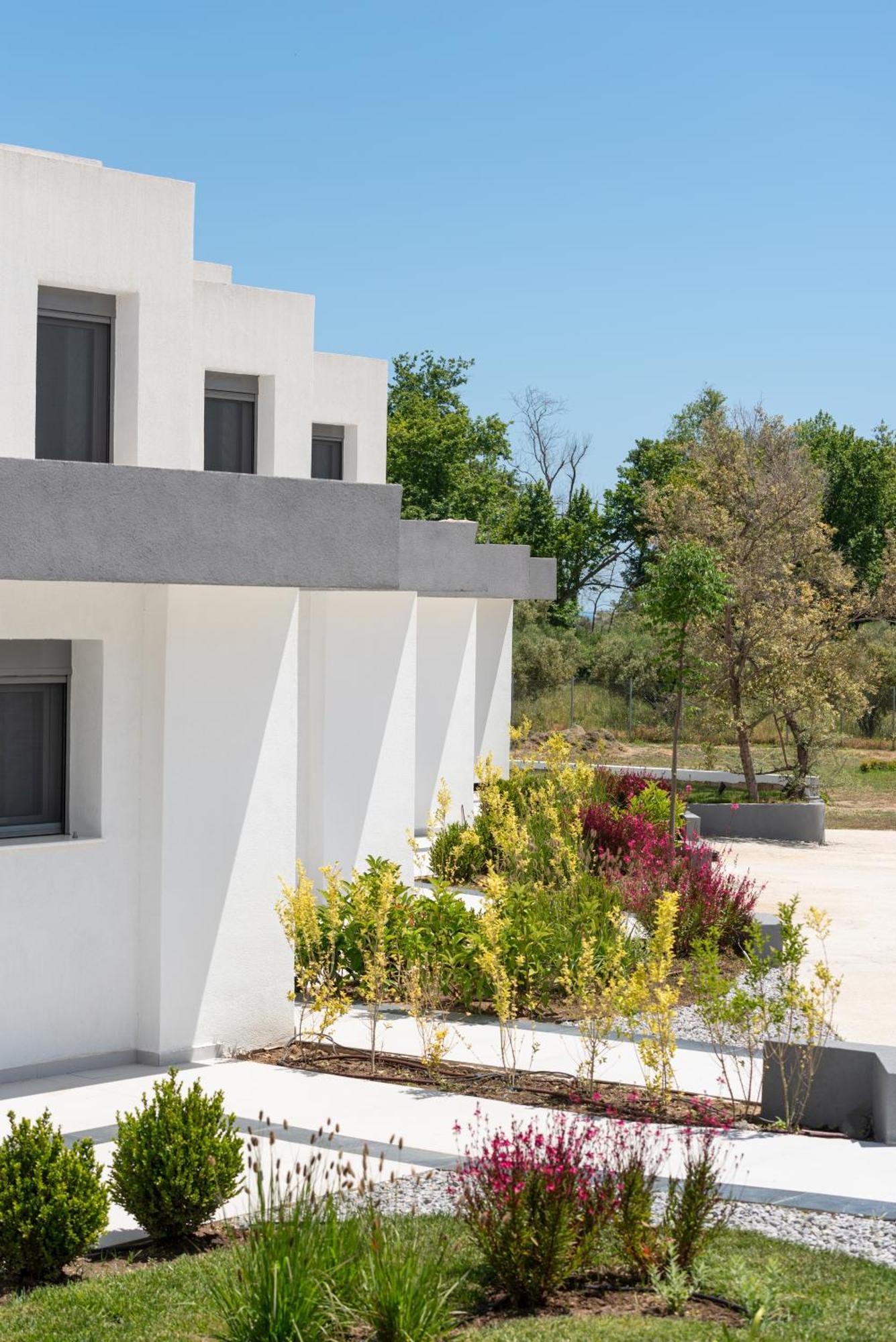 Elysium Villas Quartet Sarti Bagian luar foto