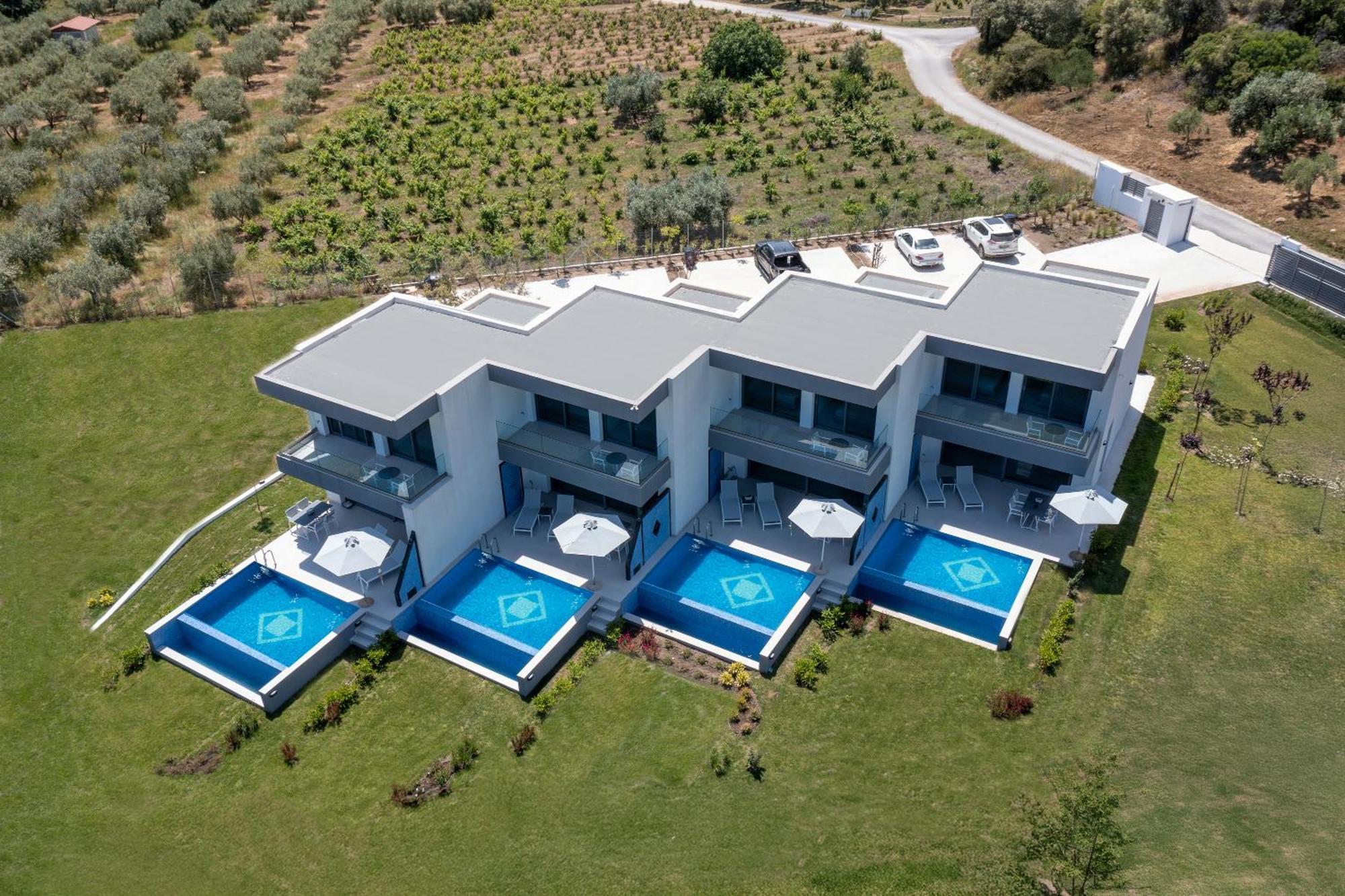 Elysium Villas Quartet Sarti Bagian luar foto
